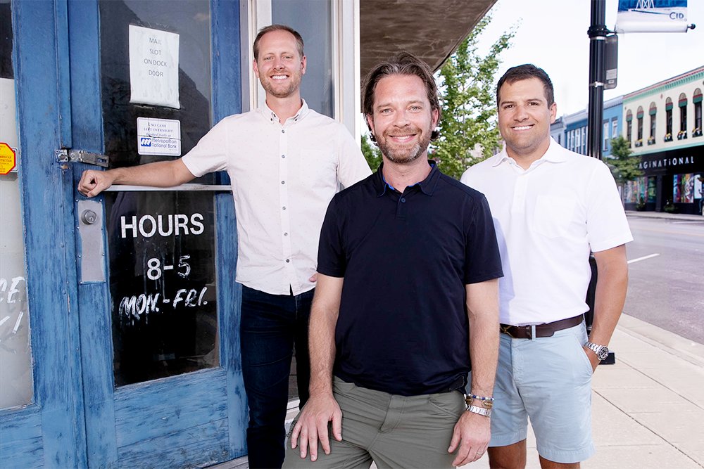 DEVELOPMENT DESIRES: Arkifex Studios partners including, from left, Michael Hampton, Tyler Hellweg and Cody Danastasio, seek to demolish a vacant Commercial Street building to develop a mixed-use project.